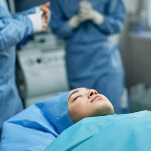 Woman under local anesthesia about to enter surgery